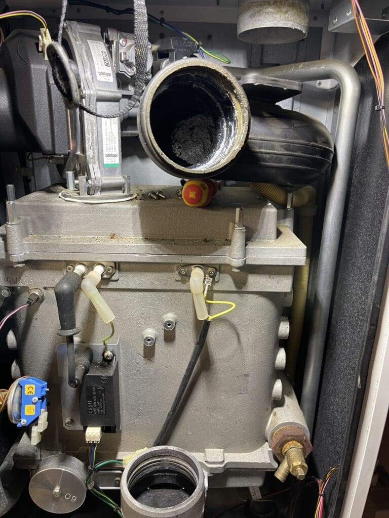 Commercial boiler service in Norwich with internal boiler components inspected and cleaned