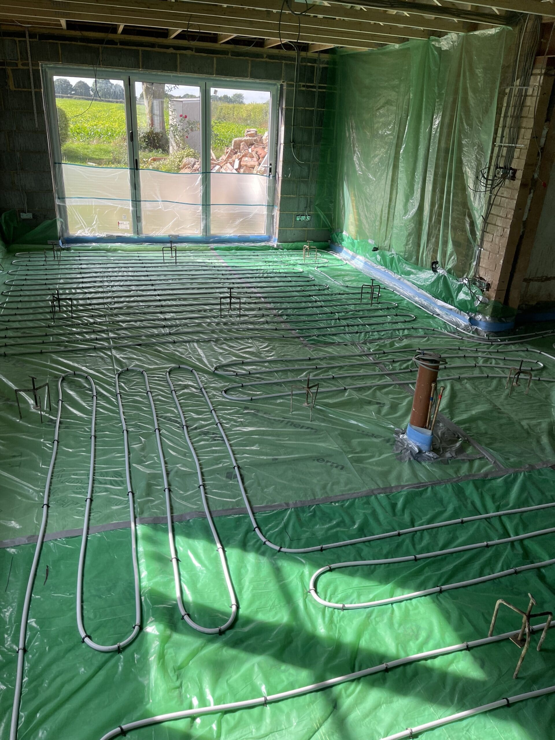 Underfloor heating installation in Norwich with pipework laid before floor screed