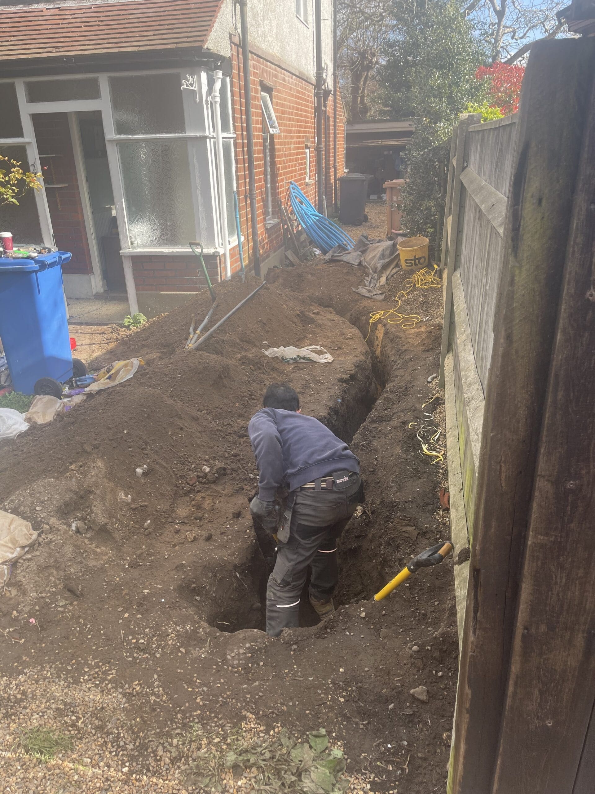 Water main installation in Norwich with trench excavation and new pipework preparation