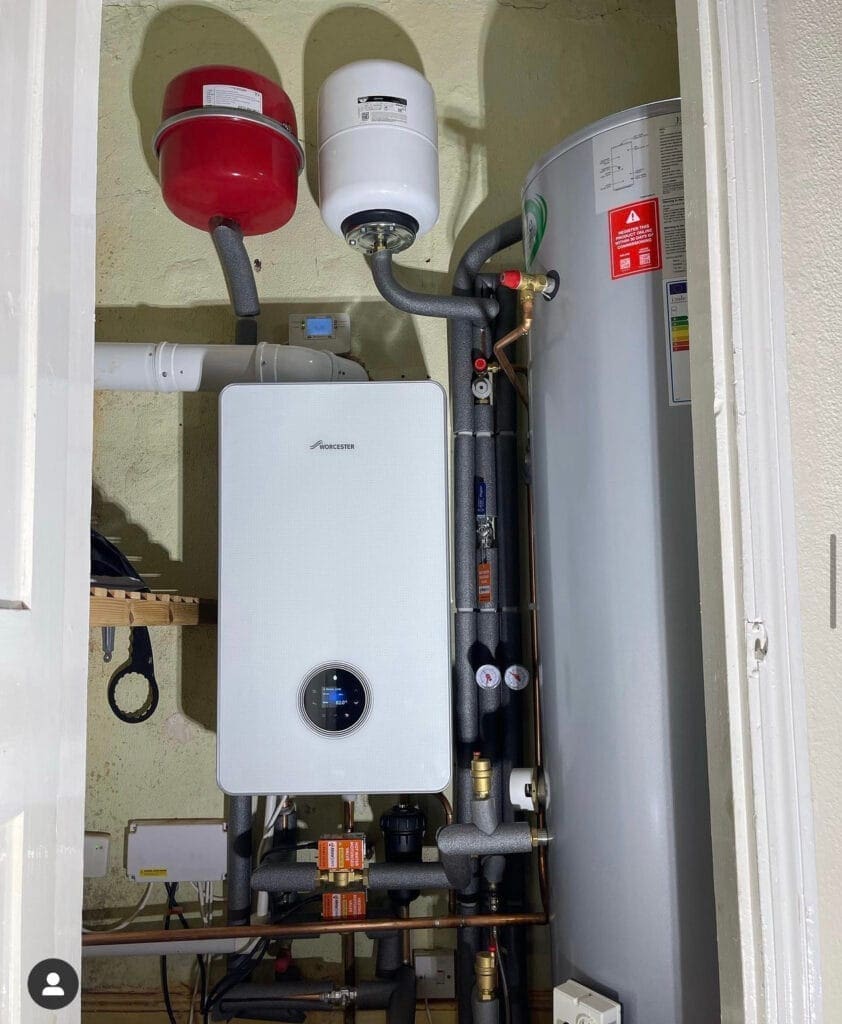 Worcester Bosch LPG boiler installation with hot water cylinder, expansion vessels and insulated pipework