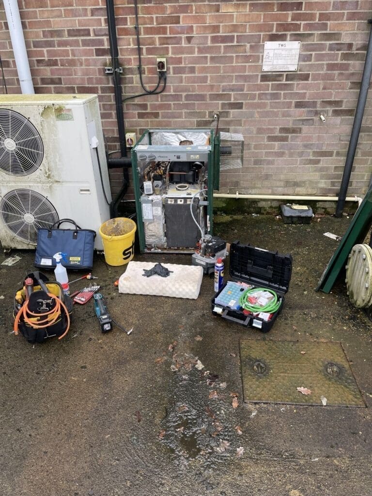 Why Annual Boiler Servicing Matters in Fakenham | Allstar Systems Ltd Heating engineer carrying out annual boiler servicing in a Fakenham home